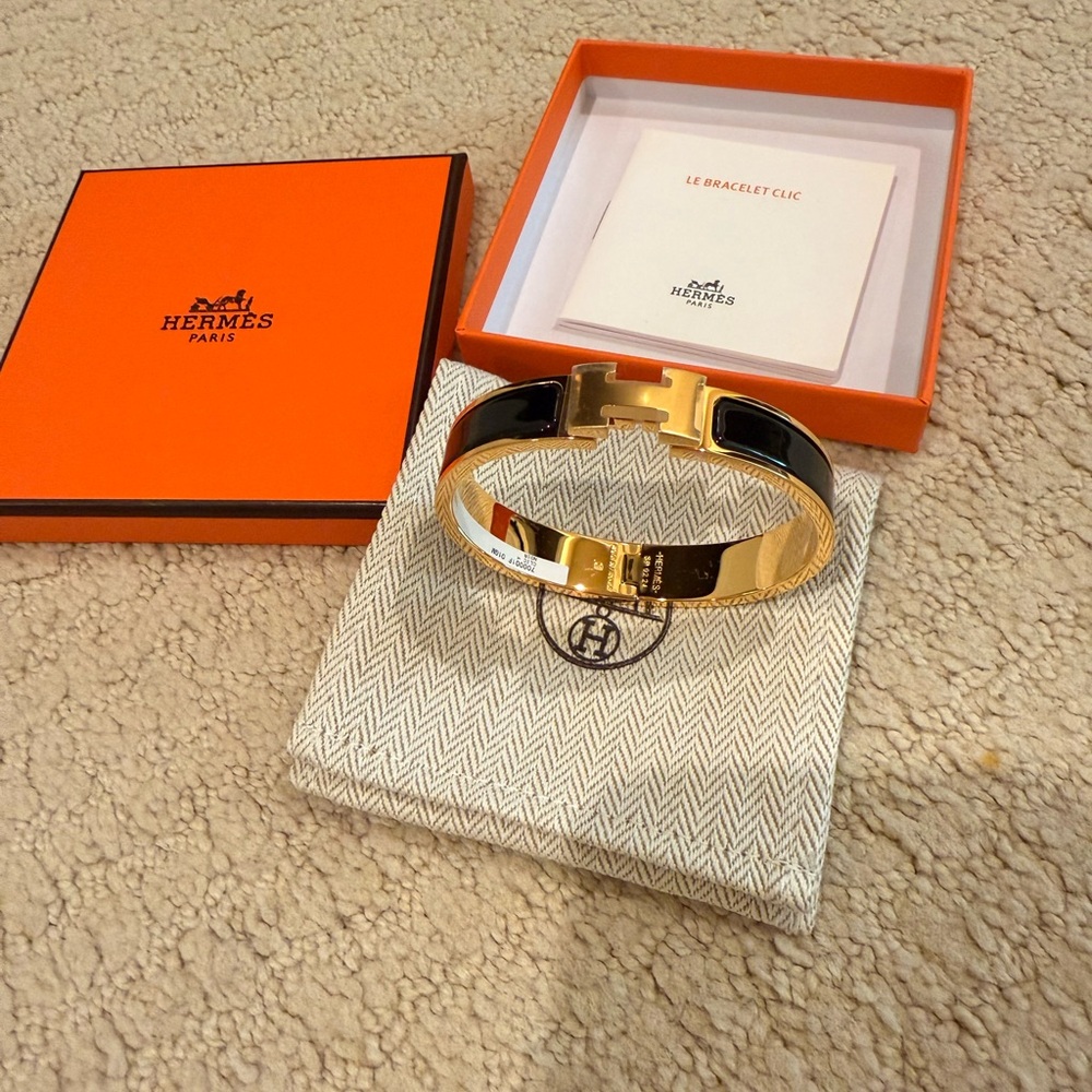 Hermès Gold and Black clic h Bracelet